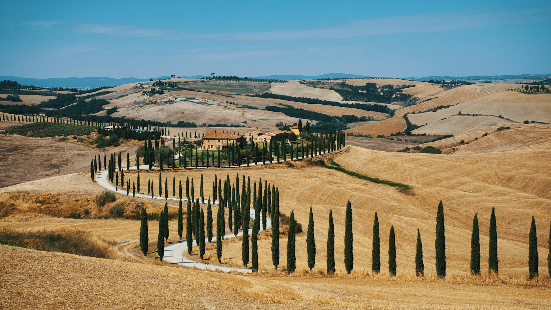 Travel bucket list - a footpath in the countryside, Tuscany - Photo by doozydoom on Pexels.com