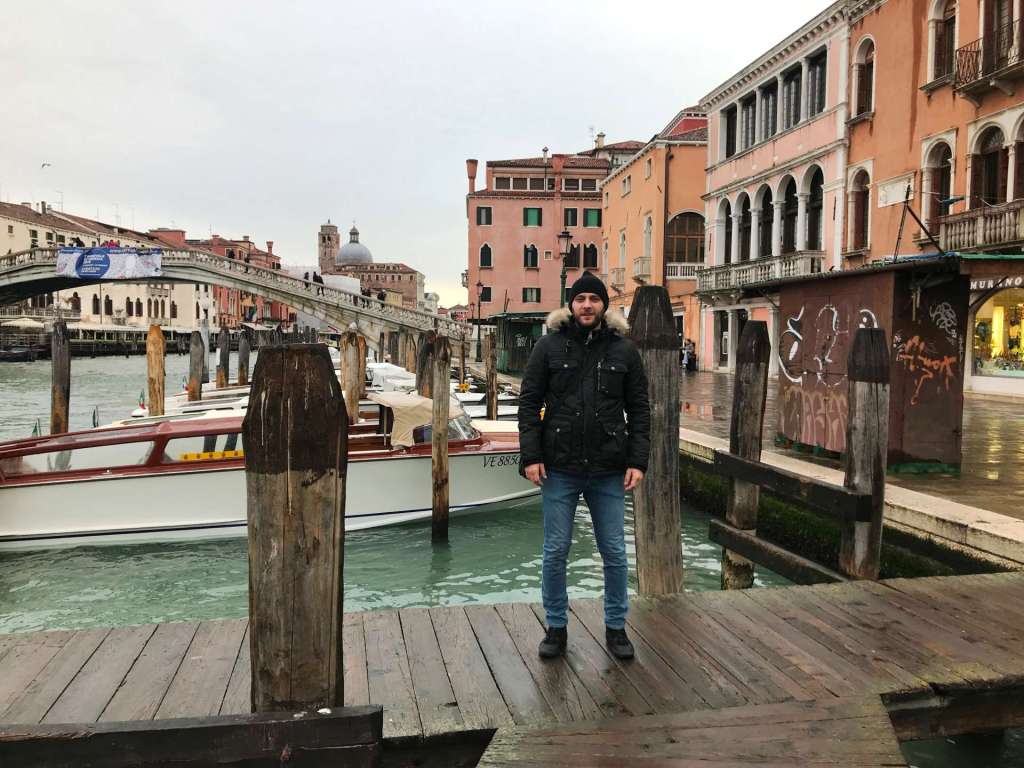 Ponte degli Scalzi in the background Ponte degli Scalzi in the background, walking to Rialto Market and Bridge - venice carnival Italy