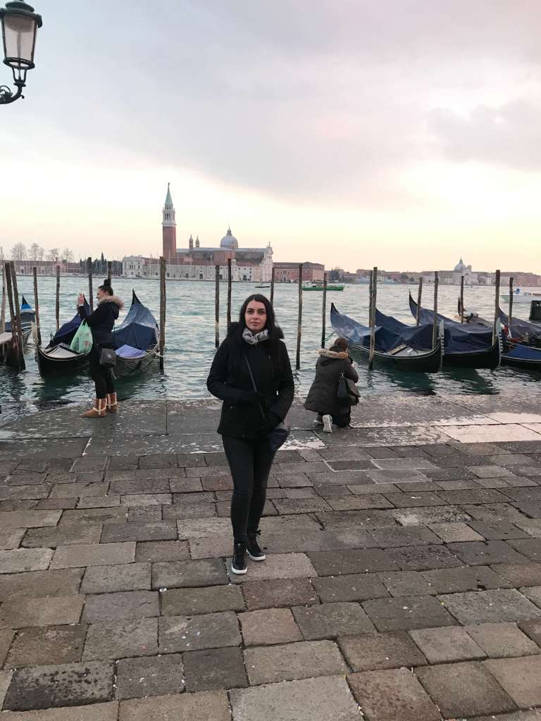 Riva degli Shiavoni- blue gondolas Riva degli Shiavoni- blue gondolas - San Giorgio Maggiore in the back