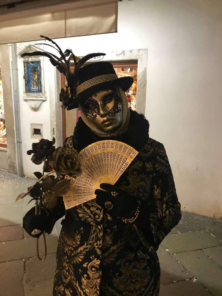 Venice Italy Carnival - Black and golden costume and mask Venice Italy Carnival - Black and golden costume and mask