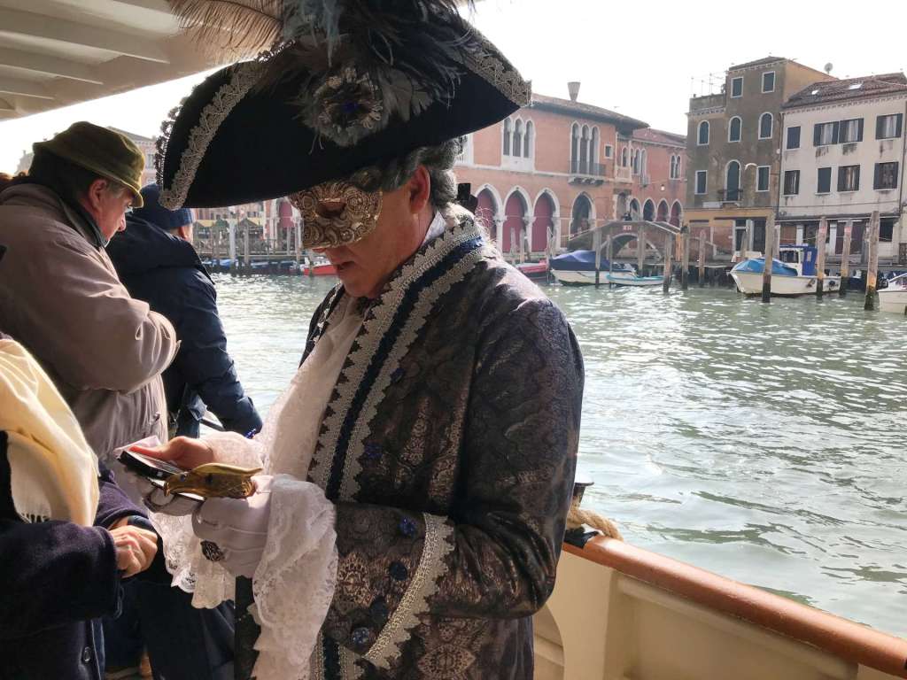 Venice Carnival Italy - costume on vaporetto no. 1 Venice Carnival Italy - costume on vaporetto no. 1
