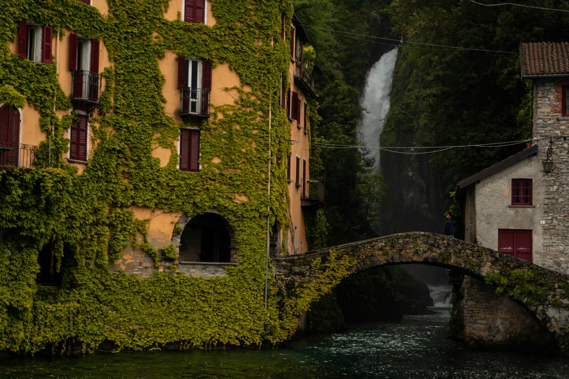 clinging plant on hotel building in nesso italy, orrido di nesso