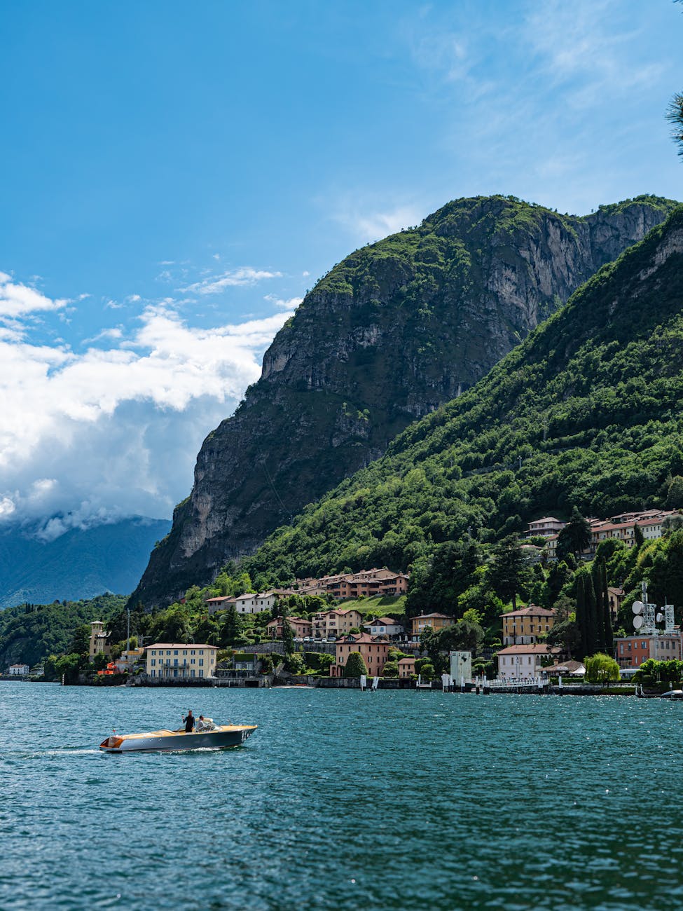 Menaggio, Italy Lake Como view from the ferry - Photo by Christopher Politano on Pexels.com, como lake against townscape in italy