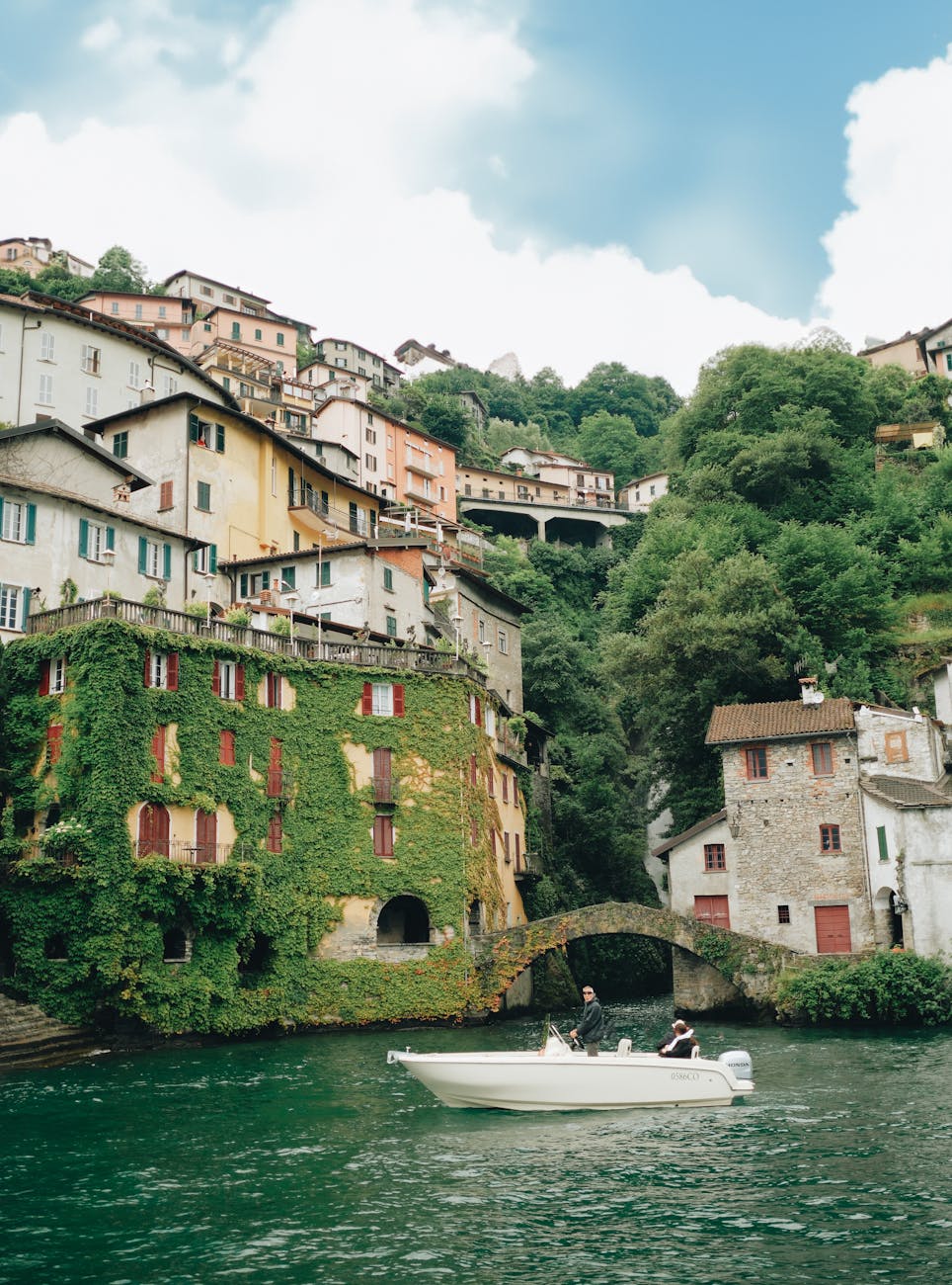 motorboat in town on lake como in italy, orrido di nesso